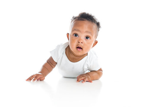 five month old African American baby boy on studio white