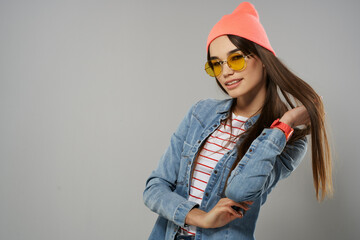 woman in denim jacket wearing glasses studio home fashion