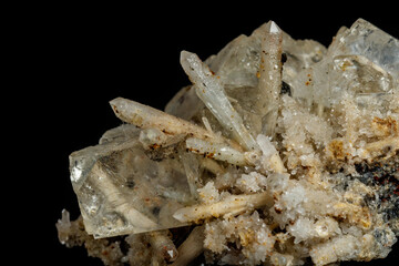 Macro mineral stone fluorite with quartz against black background