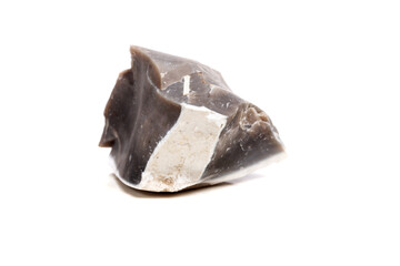 Macro mineral stone Flint in the rock on a white background