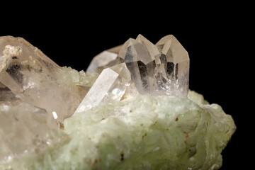 Macro mineral stone Prehnite quartz on a black background
