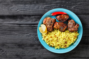 roasted meat served with raisins saffron rice