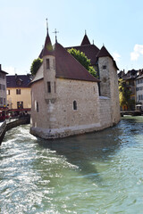 Front view of the island castle on the Thiou canal in Annecy France