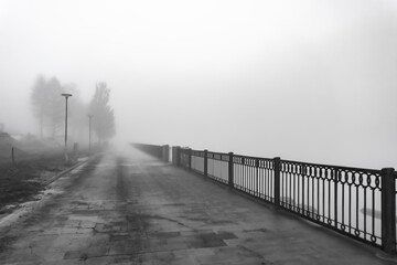 River embankment covered with fog in autumn-1