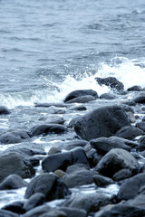Beautiful romantic photo, seashore on the beach. Relaxing seascape. Waves with foam on the sea. Summer sunny day. Vacation spirit. Beautiful landscape. Nature background. 