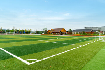 The football field and the cabin are in the park