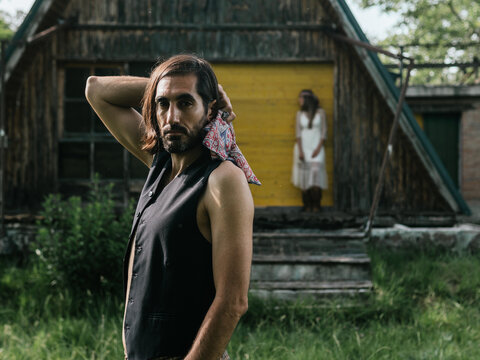 Hippie couple in an abandoned house