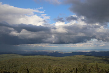 Obraz premium A view to the landscape with stormy clouds coming at Ore Mountains, Czech republic