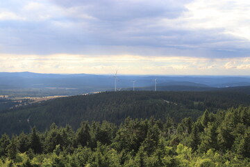 A view to the wind turbines during sunset at Ore mountains, Czech republic