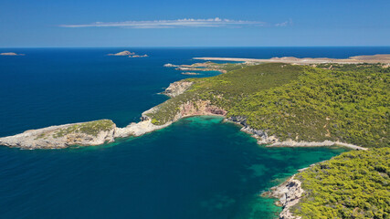 Aerial drone photo of famous small bay of Agalipa with crystal clear emerald sea featuring iconic...