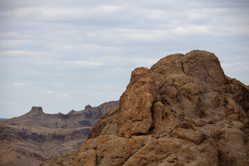 Fototapeta premium Gold Cross on a rock in Tamgaly Tas tract. Tamgaly became a UNESCO World Heritage Site in 2004. Republic of Kazakhstan, Almaty Region.