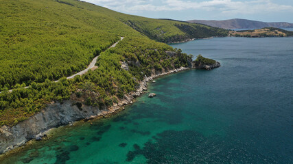 Aerial drone photo of beautiful sandy bay and picturesque small chapel of Agios Fokas in island of Skiros, Sporades, Greece