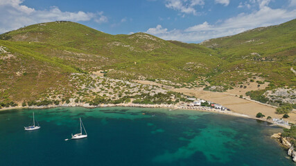 Obraz premium Aerial drone photo of beautiful sandy bay and picturesque small chapel of Agios Fokas in island of Skiros, Sporades, Greece