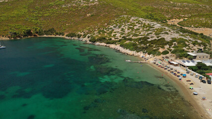 Fototapeta na wymiar Aerial drone photo of beautiful sandy bay and picturesque small chapel of Agios Fokas in island of Skiros, Sporades, Greece