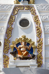 Fototapeta Sculpture of Ganesha sitting on his vehicle rat at Bada Ganapati Temple in Indore, India obraz