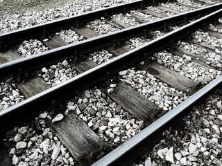 rails and sleepers, railroad and stones. Railway traffic, Perspective. Metal rails with concrete...