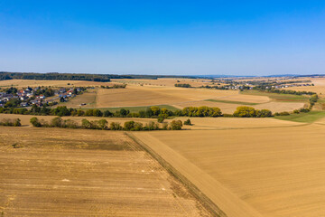 Obraz premium ird's eye view of harvested fields in the Taunus / Germany in autumn 