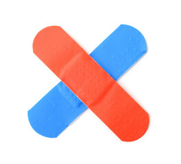 Crossed colorful adhesive bandage patches