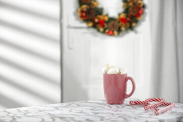 Pink mug with christmas decoration. 