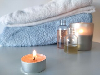 candles and towels in home spa
