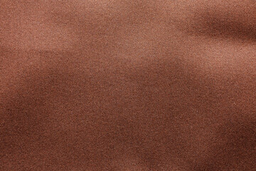 brown fabric texture background closeup