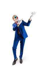 Man in a clown mask and a business suit. Isolated over white background. Hand gesture pointing to the top with white gloves. Halloween.