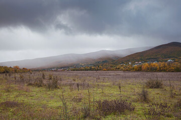 Fototapeta premium Fog is covering the valley. Atmospheric landscape. Nature, environmental conservation, ecology