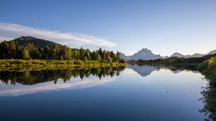 Fototapeta na wymiar Beautiful evening sunset at Oxbow bend overview snake river, Grand Teton National Park during summer Wyoming.