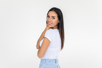 Young woman looking at camera toothy smiling isolated over white background
