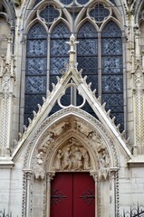 Fototapeta na wymiar Paris, France - famous Notre Dame cathedral facade saint statues. UNESCO World Heritage Site