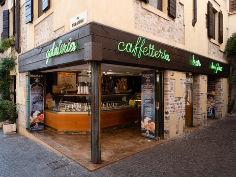 Sirmione, Italy - August 8 2021: Gelateria and Caffeteria Ice Cream Vendor and Cafe da Gino Mancini