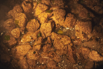 meat is cooked in a slow cooker