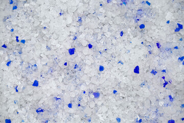 Silica gel filler for a cat's toilet. A modern safe substance for removing unpleasant odors. Moisture-retaining crystals