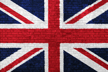 Fototapeta premium Wall painted with United Kingdom flag of Great Britain. Business concept of crisis, international commercial tensions and BREXIT. Immigration barriers and political conflicts. 3D illustration