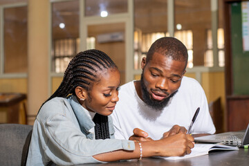 Fototapeta na wymiar two african students study together