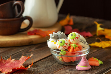 A creative idea for serving a sweet marshmallow snack for Halloween. Selective focus. Halloween...