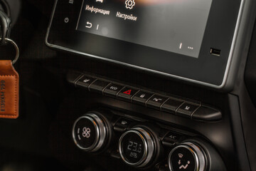 Modern car dashboard with navigation system and usb port. Car interior USB slot.