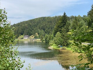 Obraz premium Picturesque small mountain accumulation lake Mrzla Vodica - Gorski kotar, Croatia (Slikovito malo goransko akumulacijsko jezero Mrzla Vodica - Gorski kotar, Hrvatska)