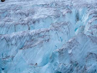photos of mountains, glaciers, icebergs, and sea ice in the Canadian Arctic landscape. 