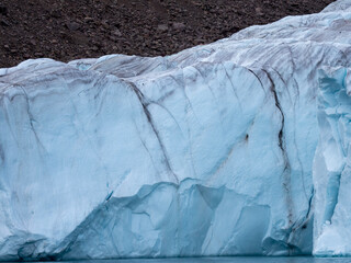 photo of mountain, glacier, sea ice, ocean and icebergs in the canadian arctic