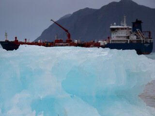 photo of mountain, glacier, sea ice, ocean and icebergs in the canadian arctic