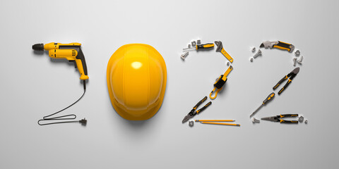 "2022" made from a set of construction tools and a protective helmet on a white background.
Creative 2022 New Year calendar or felicitation template for building and engineering companies. 3D render.