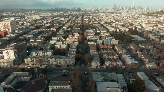 Aerial flying over Bernal Heights Park with a view to the San Francisco City skyline. California, USA