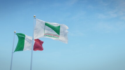 Waving flags of Italy and the Italian region of Emilia-Romagna against blue sky backdrop. 3d rendering