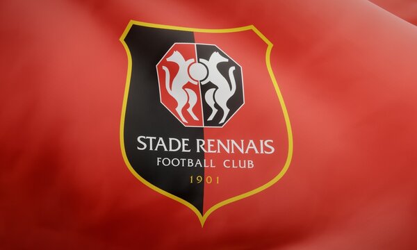 Logo of French football club Stade Rennais F.C. on waving fabric. Editorial 3D rendering