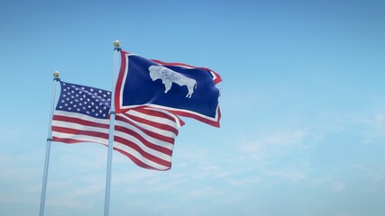 Fototapeta premium Waving flags of the USA and the US state of Wyoming against blue sky backdrop. 3d rendering