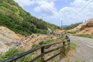Fototapeta premium Railing near road at Sulphur Springs Soufriere Saint Lucia