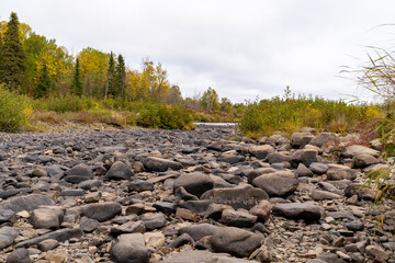 Rocky area of the Pigeon River in Grand Portage State Park in Minnesota during autumn