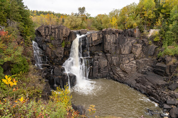 High Falls waterfall in Grand Portage State Park in the fall autumn season