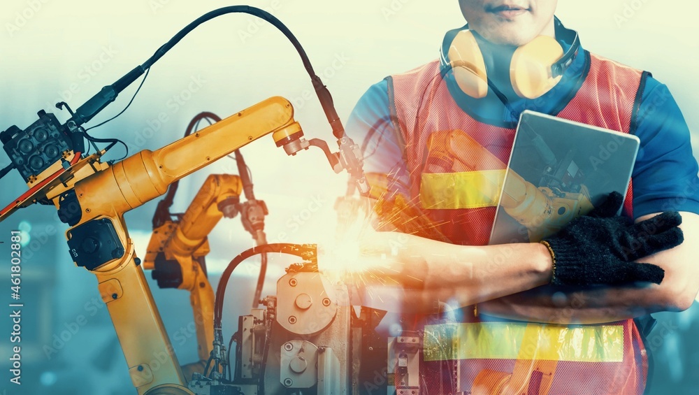 Poster mechanized industry robot arm and factory worker double exposure . concept of robotics technology fo